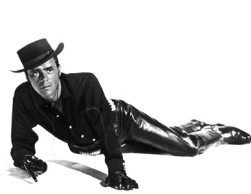 Dirk Bogarde in black leather pants 1960