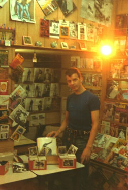 Edward inside his magazines shop